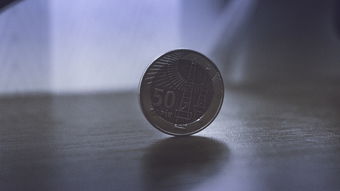  一枚劳力士间金表面镀金有多少克金？